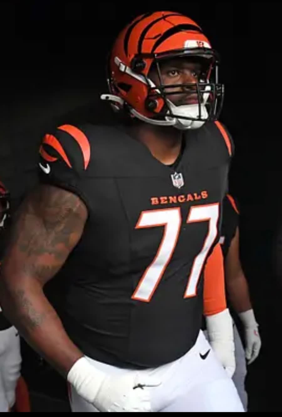 Client, Cincinnati Bengals number 77, in helmet