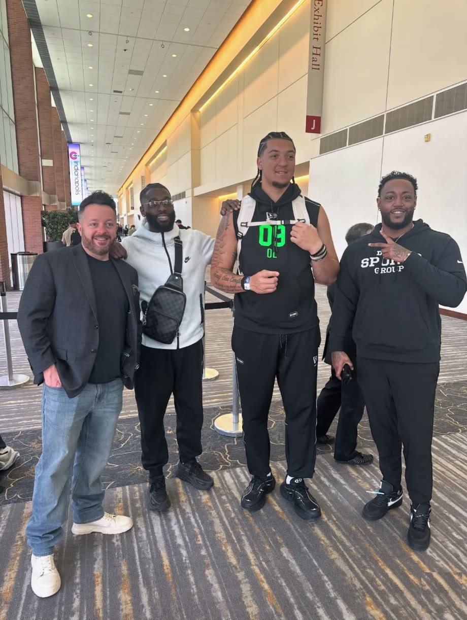 Travis Burke with his Delta Sports Group agents at the NFL Combine in Indianapolis